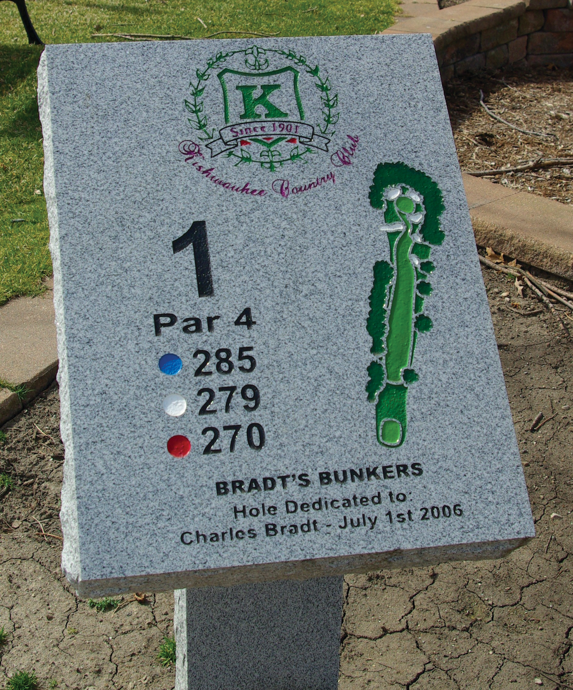 carved grey granite tee sign