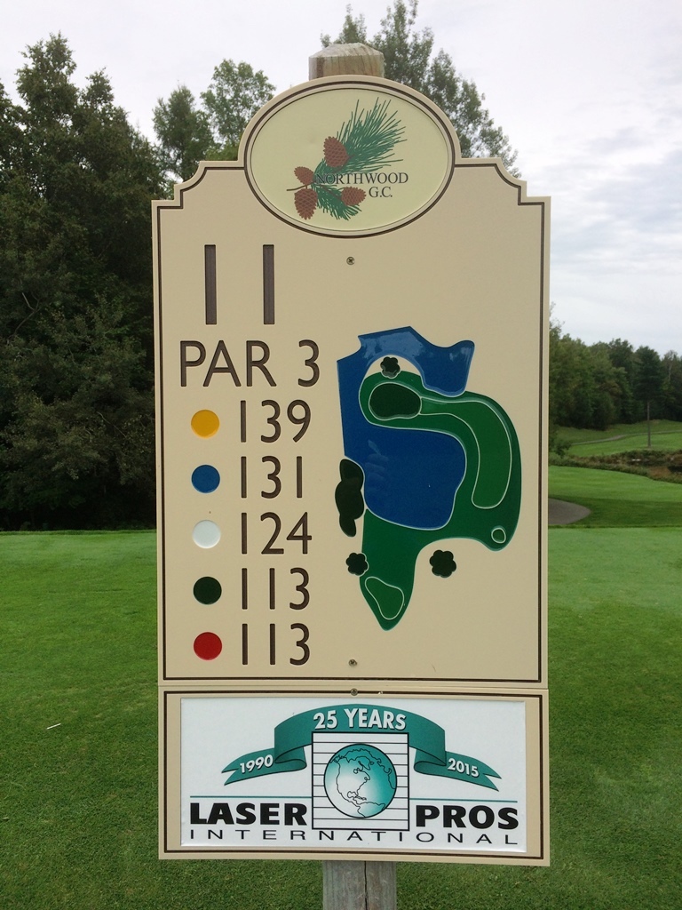 routed tan brown tan color core tee sign with sponsor panel